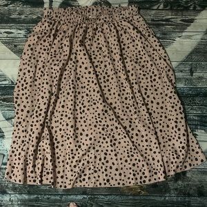A gorgeous skirt with a crafted style dotted print